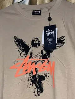 Stussy ベージュ Tシャツ 天使 グラフィック