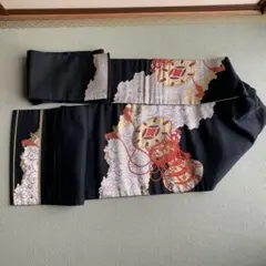 値下げ　黒地金色模様帯　お祝い事に。