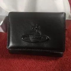 109黒値下げ！ヴィヴィアンウエストウッド折り財布財布がま口 アウトレット品