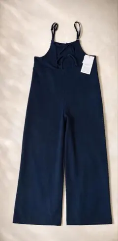 新品タグ付き　ネイビーサロペット 肩ひも調節ストラップと背面リボン結びが特徴