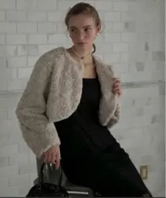 BONLECILL noir パール付きワイドスリーブフェイクファーボレロ