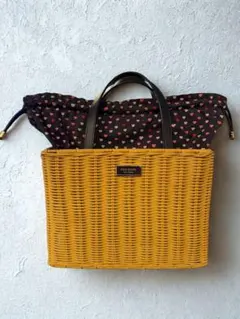 kate spade ラタンかごバッグ　リップ柄巾着付き