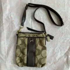 COACH ロゴ入りキャンバスポーチ