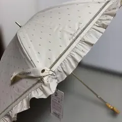 新品 ジルスチュアート ラメ フリル 楽折 兼用 一級遮光 日傘 ベージュ