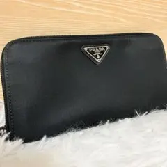 プラダ サフィアーノ 長財布 ラウンドジップ 黒 M506Aギャランティ