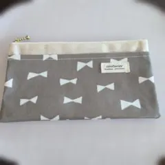 couturier リボン柄ポーチ