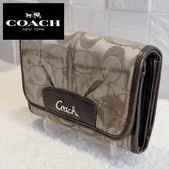 COACH コーチ 二つ折り財布 ベージュ　シグネチャー　キャンバス