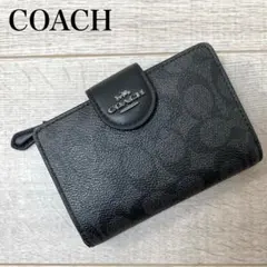 COACH コーチブラックレザー 二つ折り財布 エンボス加工 ブラック
