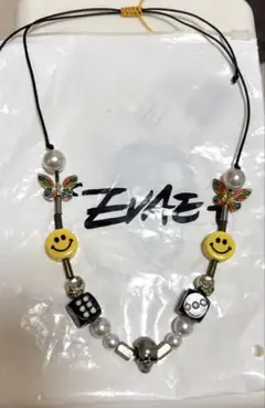 evae smiley pearl necklace