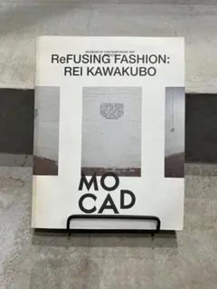 ReFUSING FASHION: REI KAWAKUBO - メルカリ