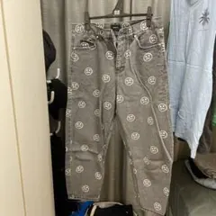 MASSNOUN ロゴプリントデニムパンツ