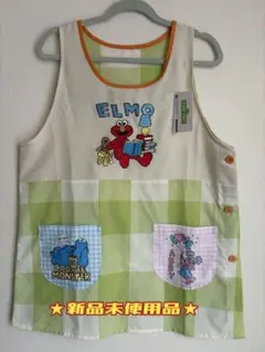 【新品】♡セサミストリートエプロン♡エルモ刺繍柄サイズＭ〜Ｌꕤ*.゜のサムネイル