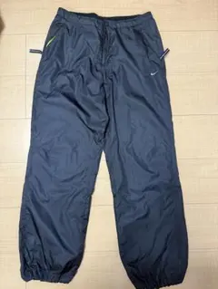 NIKE ウインドブレーカー ナイロンパンツ 裏フリース レディースS