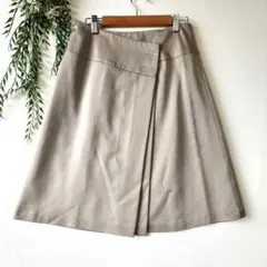 ロペ【63_90】ラップスカート 光沢 グレー エレガント 膝丈