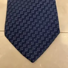 HERMES 青い幾何学模様のシルクネクタイ