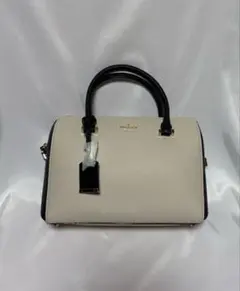 kate spade ベージュと黒の合成皮革ハンドバッグ