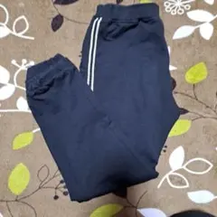 黒のコットン混紡長ズボン サイドストライプ