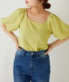 coutinuer de NICE CLAUP バッククロス袖ボリュームトップス