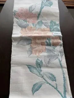 アンティーク名古屋帯☆織り物の風合いがある淡いピンクのベースに可憐な花