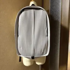 Issey Miyake Homme Plissé pleated backpack, off-white.