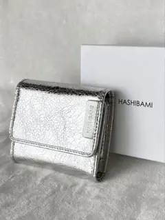 【未使用】HASHIBAMI ハシバミ 三つ折り財布 シルバー 箱付きのサムネイル