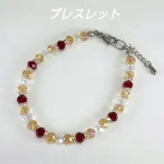 ダークレッドボタンカットビーズとシルバーロンデルのハンドメイドブレスレット