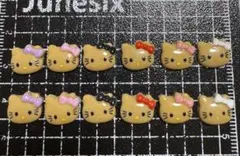 ハローキティ ネイルパーツ 12個セット　日焼け