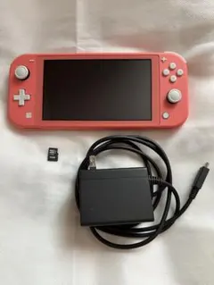 ジャンク品(液晶) Nintendo Switch Lite コーラル 桃鉄付き - メルカリ