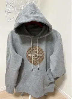 正規店購入　コーチシグネチャーブランドロゴフーディー　M