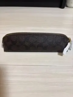 COACH シグネチャー ペンケース ブラウンのサムネイル