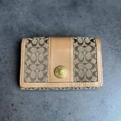 COACH レザー　シグネチャー 二つ折り財布　コンパクトウォレット　ベージュ