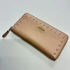 COACH ラウンドファスナー長財布 スタッズ ビジュー ピンクベージュレザー