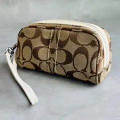 COACH Signature cosmetic Wristlet pouch