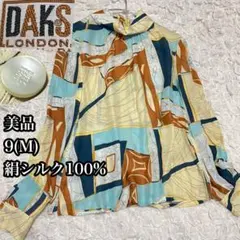 美品【ダックスDAKS LONDON】シルク ブラウス 総柄 サラサラ トップスのサムネイル