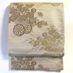 6k387 京袋帯　絹　唐織　金色　ベージュ　銀色　花柄　和装　着物