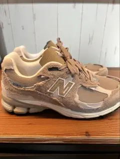 New Balance ベージュ スニーカー