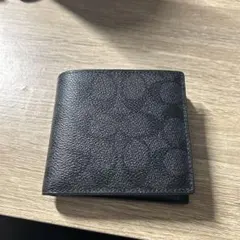 新品・未使用】COACH ブラック 二つ折り財布 型番:CJ883 - メルカリ
