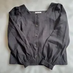 continuier de NICE CLAUP ブラックシャツ