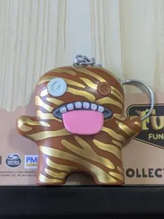 FUGGLERファグラー　キモくてかわいいモンスターキーチェーン　茶金　べろ