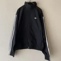 adidas シャドウ トレフォイル 刺繍 ウインドブレーカー ブラック