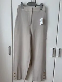 ナチュラルビューティーベーシック ベージュ ワイドパンツ ボタン付き