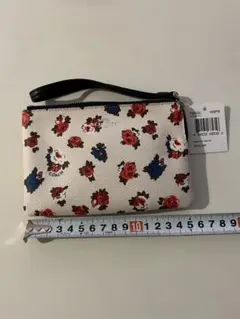 【新品未使用】COACH 花柄ベージュポーチ ストラップ付き
