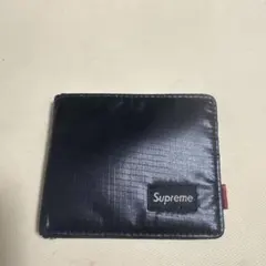 2026年最新】SUPREME 二つ折り財布の人気アイテム - メルカリ