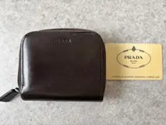 PRADA 二つ折り財布 1M0844 ダークブラウンのサムネイル