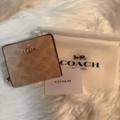 COACH 二つ折り財布 ベージュ