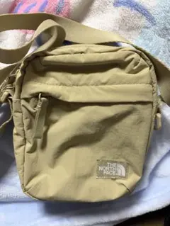 THE NORTH FACE TRAVEL CROSS BAG S ベージュ