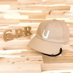 【アンネームドヘッドウェア】ミドル クラシック Uロゴ キャップ ベージュ×白のサムネイル