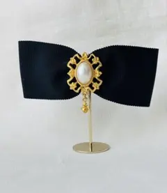 黒リボン パール調装飾 ブローチ