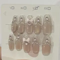 SHEIN ネイルチップ Sサイズ リボン ビジュー ベージュ マグネットネイルのサムネイル