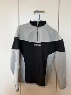 Nike ハーフジップ ナイロン　トップス　黒 グレー　レディースのサムネイル